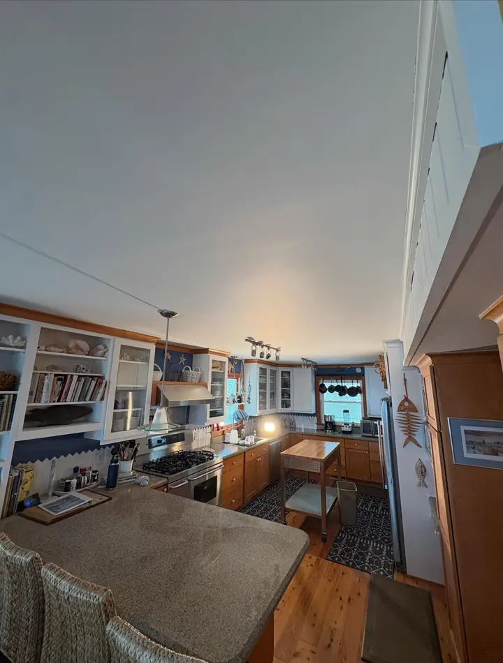 Repaired, freshly painted kitchen ceiling